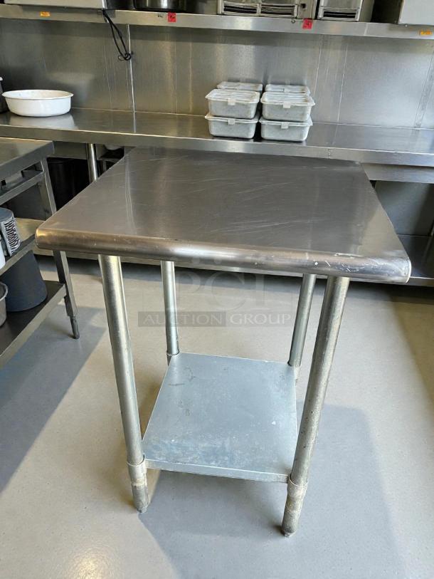 GSW USA WT-P2484 24" stainless steel worktop table in excellent condition, features sturdy construction and a lower shelf.