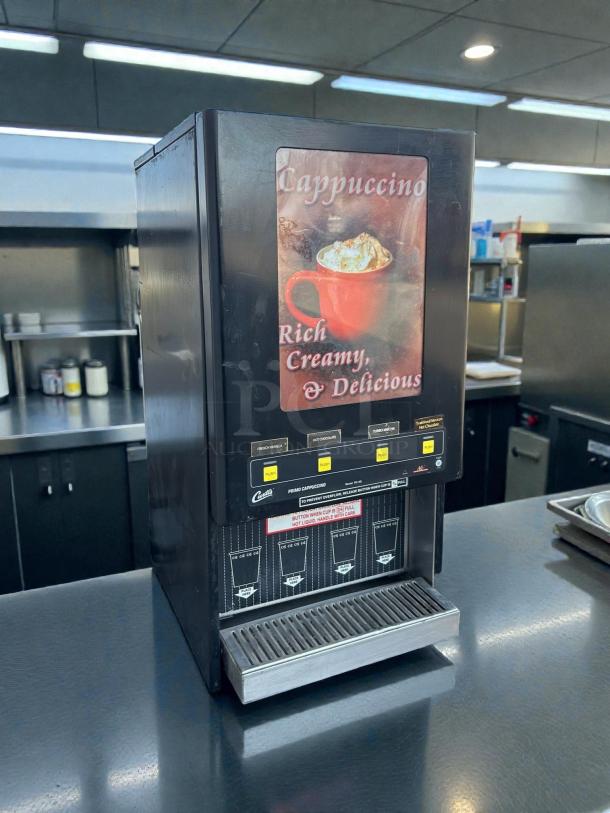 Curtis PC-4D-10-01 cappuccino dispenser, 4 station, great condition, tested and working, "Rich Creamy Delicious" signage.