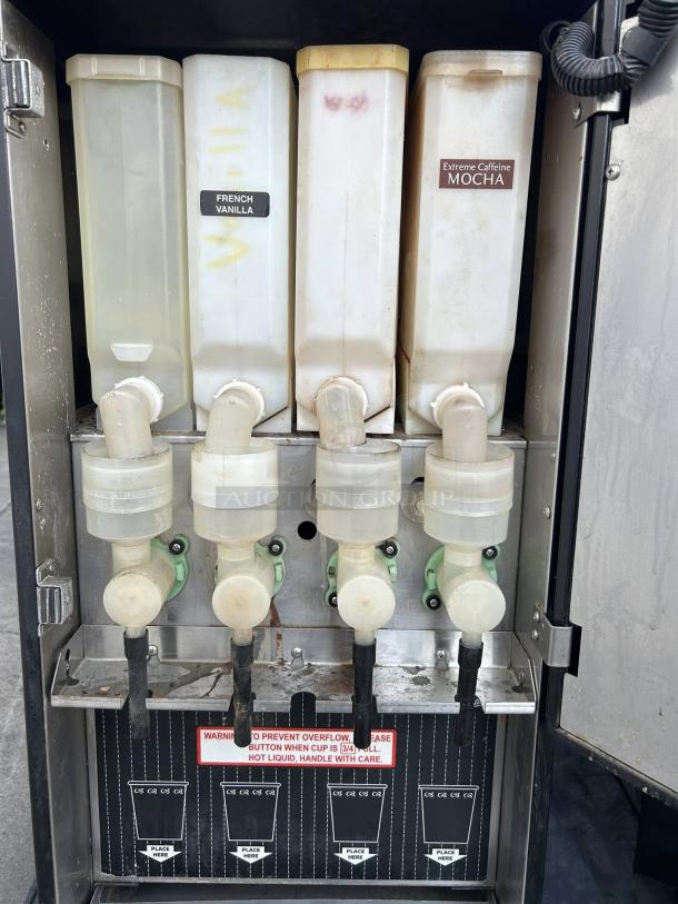 Curtis PC-4D-10-01 cappuccino dispenser, 4 stations, cafe series, great condition, labeled "French Vanilla," "Mocha."