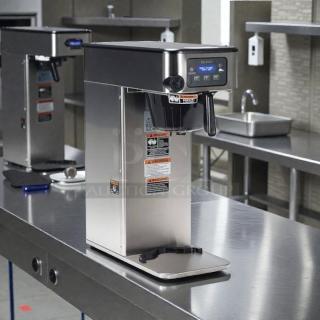 Bunn 53100.0000 ICB-DV coffee brewer in excellent condition, dual voltage, tested and working. Stainless steel, control panel visible.