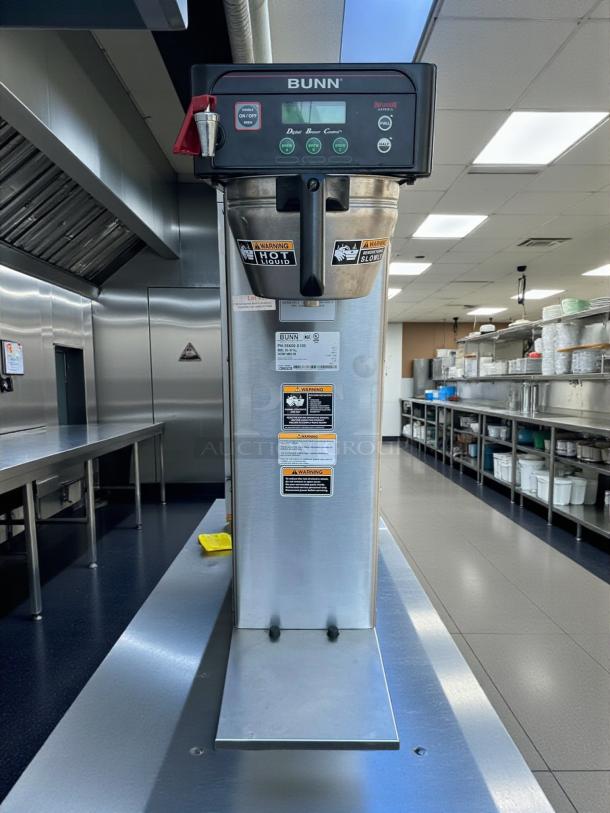 Bunn 53100.0000 ICB-DV Automatic Coffee Brewer, dual voltage, stainless steel, tested and working, warning labels visible.