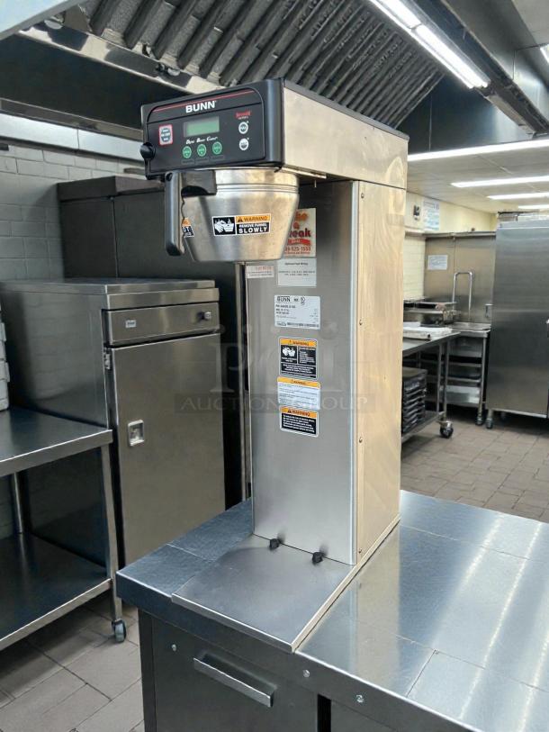 Bunn 53100.0000 ICB-DV Automatic Coffee Brewer, dual voltage, stainless steel, tested and working, visible safety warning labels.