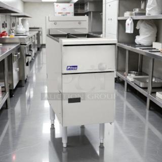 Pitco SG14TS natural gas fryer, excellent condition, 20-25 lb split pot, 100,000 BTU, tested and working, kitchen setting.