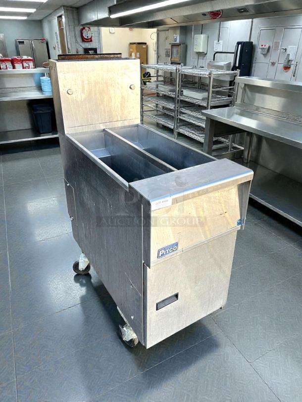 Pitco SG14TS split pot floor fryer in excellent condition, 100,000 BTU, stainless steel, natural gas, tested and working.