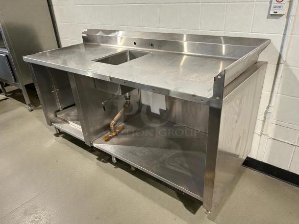 Winholt stainless steel worktop table with hand sink and backsplash; excellent condition, features durable construction.