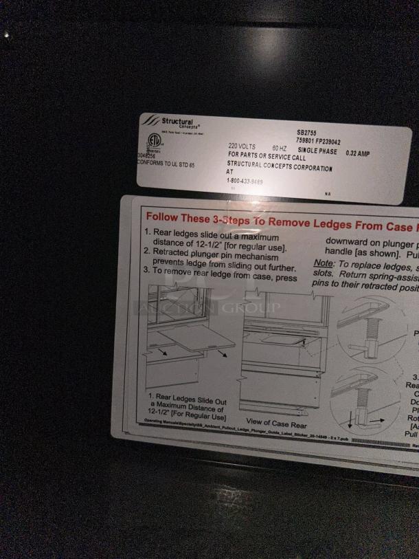 STRUCTURAL CONCEPTS S82755 27" curved bakery display case, tested and working, label with voltage and usage instructions visible.