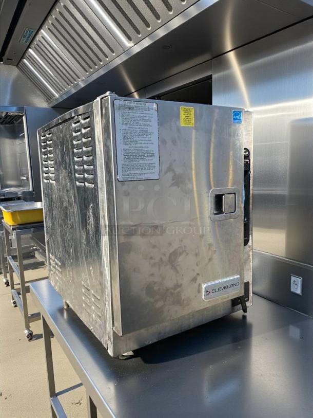 Cleveland 22CET6.1 SteamChef convection steamer, excellent condition, stainless steel, 6-pan capacity, visible user instructions.