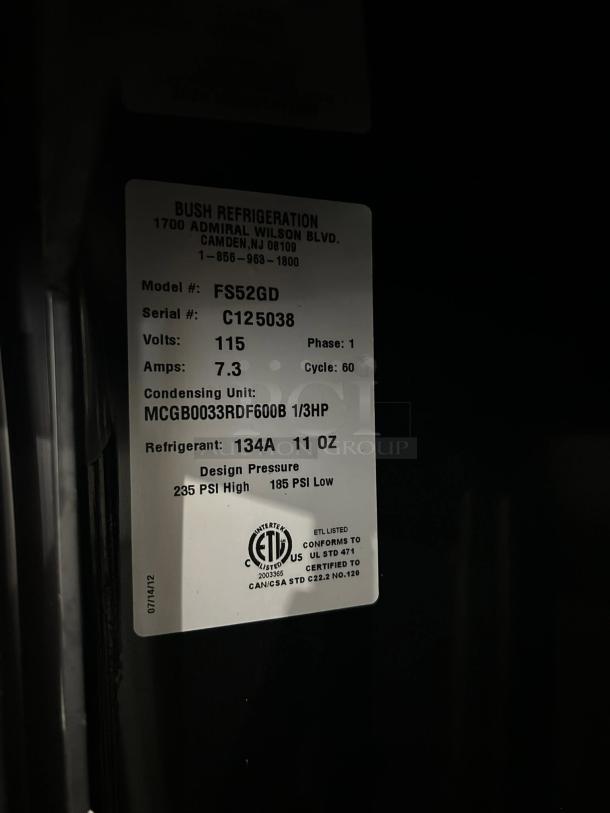 Bush Refrigeration FS52SDHC label showing model and specifications, including 115 volts, 7.3 amps, and 134A refrigerant.