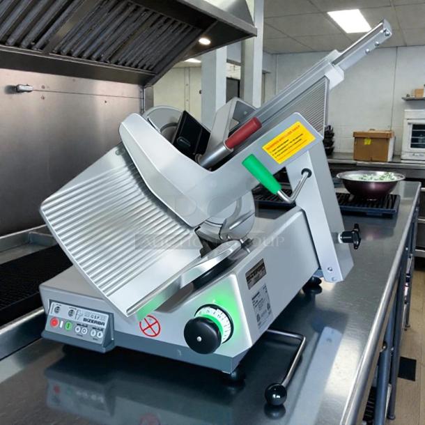 Bizerba GSPHDI90 meat slicer, aluminum, 13" blade, safety dial, 1/2 hp motor. Tested, great condition, illuminated controls.
