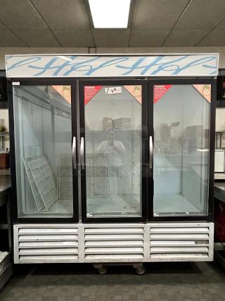 Beverage Air CRG74-1 three-door refrigerator, self-contained, tested, and working. Features glass doors and interior shelves.
