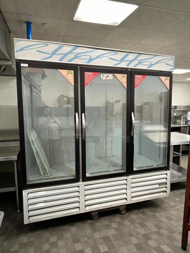 Beverage Air CRG74-1 three-door refrigerator, tested and working, excellent condition; glass doors, metal frame.
