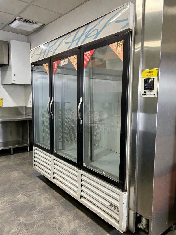 Beverage Air CRG74-1 self-contained 3-door refrigerator, black trim, glass fronts, tested and working in commercial setting.
