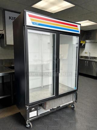 True GDM-49F-HC~TSL01 54" glass door merchandiser freezer, two sections, great condition, tested, working.