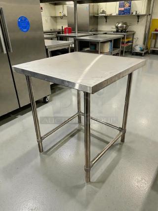 GSW 30” stainless steel worktop table, model WT-P3030, in great condition with an open base; durable for kitchen use.
