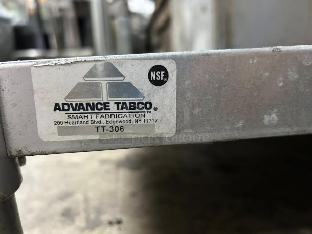 ADVANCE TABCO Model TT-306 worktop table label, NSF certified, 72" with overshelf and food warmer, excellent condition.