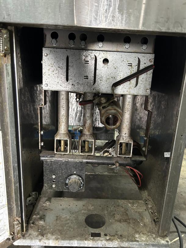 Frymaster ESG35T 35lb stainless steel gas fryer, internal view. Used condition, tested and working, with visible burner components.