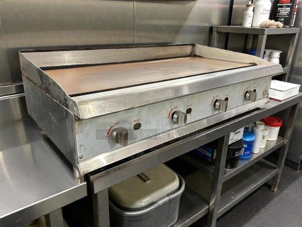 Cooking Performance Group GM-CPG-48-NL 48" gas countertop griddle with manual controls, 120,000 BTU, in great condition.