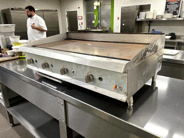 Cooking Performance Group GM-CPG-48-NL 48" gas countertop griddle, excellent condition, manual controls, 120,000 BTU, tested working.