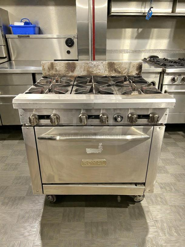 Royal RR-6-C 36″W 6-burner natural gas range with convection oven, tested and working. Stainless steel, visible Royal logo.