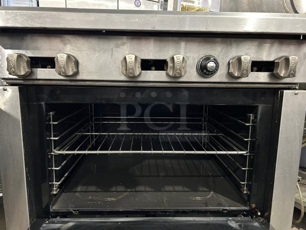 Royal RR-6-C 36″W 6-burner natural gas range with convection oven. Tested and working, stainless steel, well-maintained.