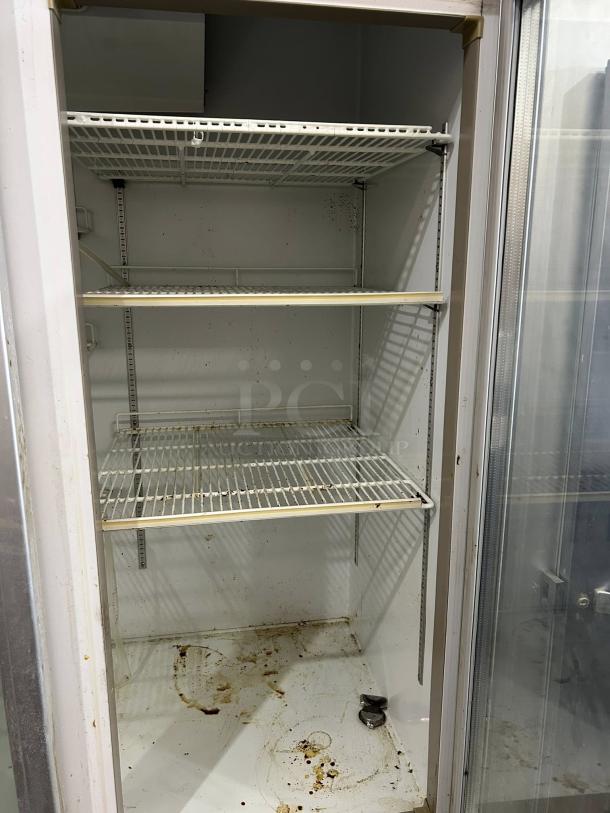 "Blue Air BAGR72-HC 82-inch refrigerator merchandiser with three glass swing doors, 72 cu. ft., R290 refrigerant, tested, working, interior needs cleaning."