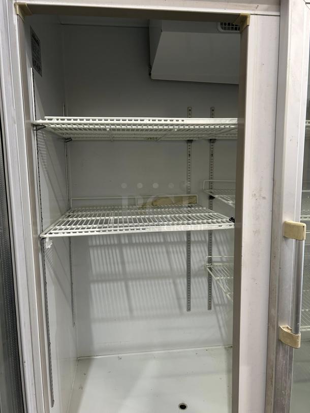 Blue Air BAGR72-HC 82" 3 glass door swing refrigerator merchandiser. Interior features adjustable wire shelves, refrigerant R290, 72 cu. ft., tested and working.