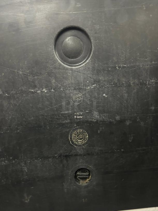 Cambro UPC400110 black insulated food pan carrier, 5 pan capacity, great condition, NSF certified, visible surface markings.