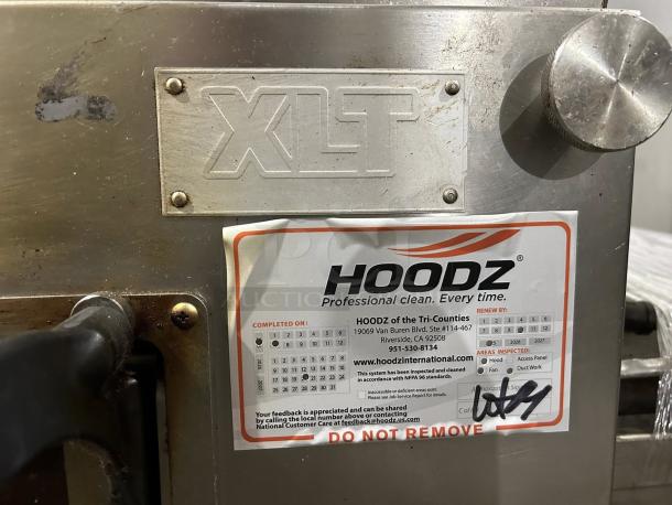 XLT 3255 Series Compact Conveyor Oven with 32" wide conveyor and 55" cooking chamber. Features HOODZ inspection sticker.