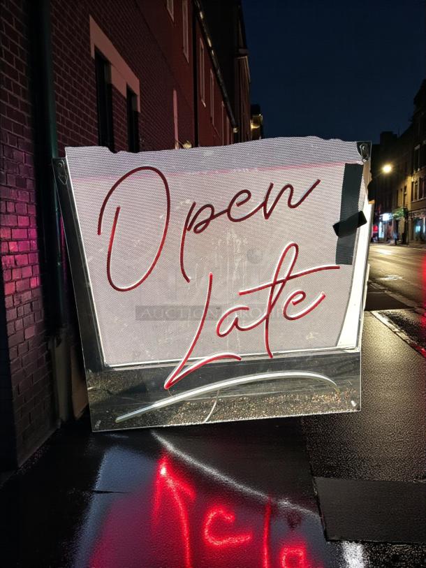 Red neon "Open Late" sign, 30"x30", in great condition. Features clear, bold lettering with reflective quality.