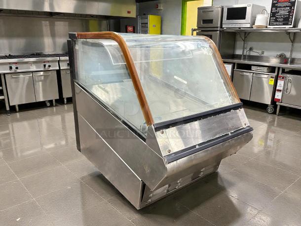 Structural Concepts DD17R refrigerated display case in excellent condition, featuring a glass front and wood trim.