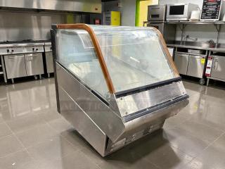 Structural Concepts DD17R refrigerated display case in excellent condition, featuring a glass front and wood trim.