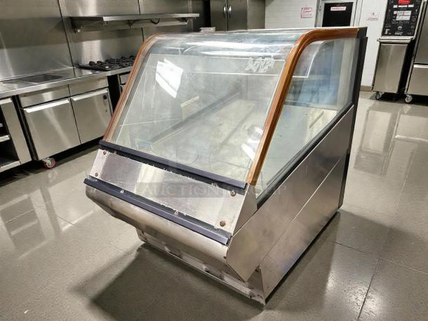 Structural Concepts DD17R refrigerated display case in excellent condition. Glass front and metal sides, tested and working.