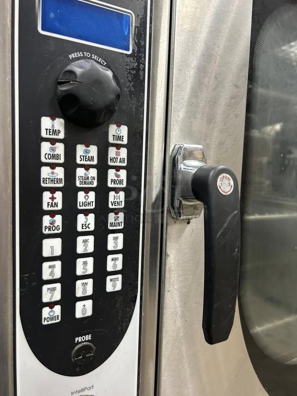 Blodgett BX-14G-NAT combi oven with manual controls. Stainless steel finish, working condition. Visible control panel.