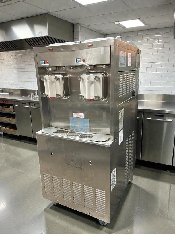 Taylor 772 Soft Serve Freezer, floor model, two-flavor, self-contained, tested and working, stainless steel finish.