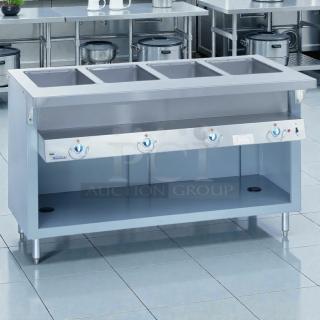Duke Manufacturing E304SW electric 4-compartment hot food table with sealed wells in excellent condition, tested and working.
