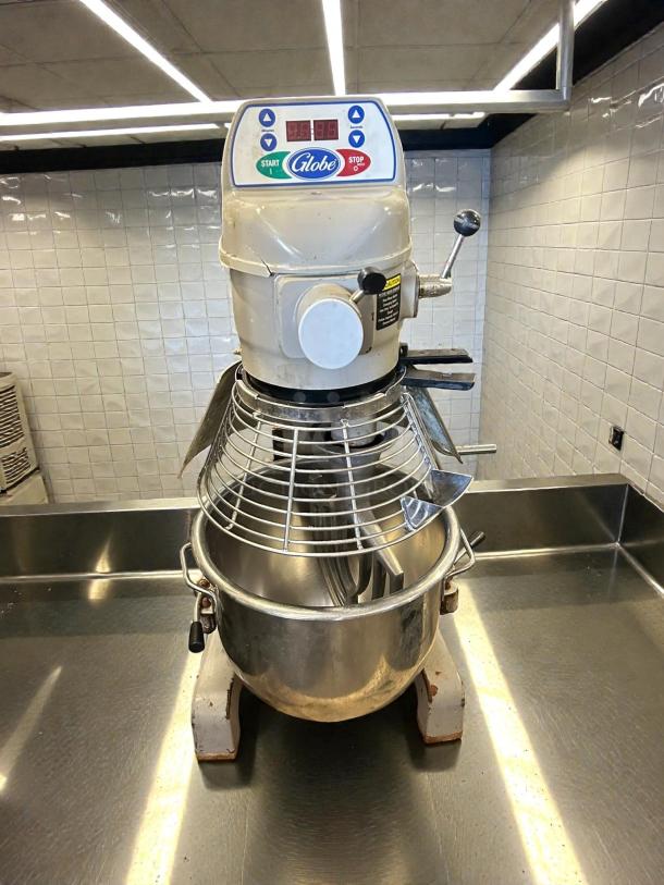 Globe SP20 20 Qt. Planetary Stand Mixer with guard, tested and working, 120V, 1/2 hp. Features controls and safety guard.