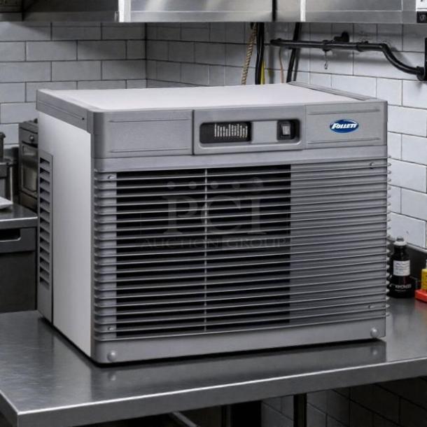 Follett HCC1410AJS Horizon Elite 29" air cooled ice machine on counter, in excellent condition, tested and working.
