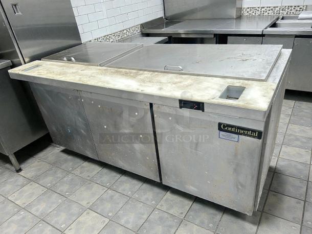 Continental SW72-N-30M 72" 3-door refrigerated prep table, stainless steel, tested and working, visible wear, Continental logo.