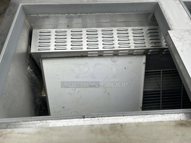 Continental Refrigerator SW72-N-30M, 72" 3-door refrigerated sandwich prep table. Tested, working, stainless steel, minor wear.