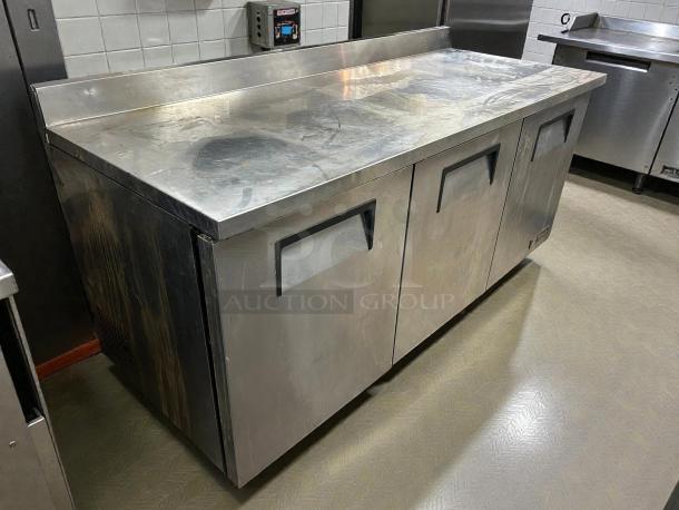 True TUC-72-HC undercounter refrigerator, excellent condition, 72" wide, three sections and doors, 115v, tested and working.