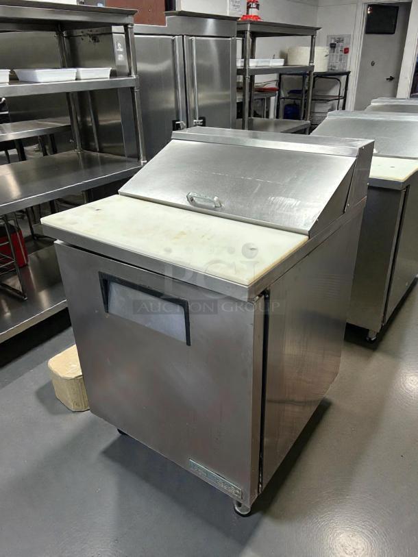True TSSU-27-08-ADA-HC refrigerated sandwich prep table. Stainless steel, right-hinged door, clean, tested, working.
