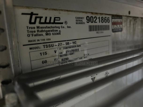 True TSSU-27-08-ADA-HC model label indicating 115V, 60Hz, with R290 refrigerant. Made in USA, serial number 9021866.