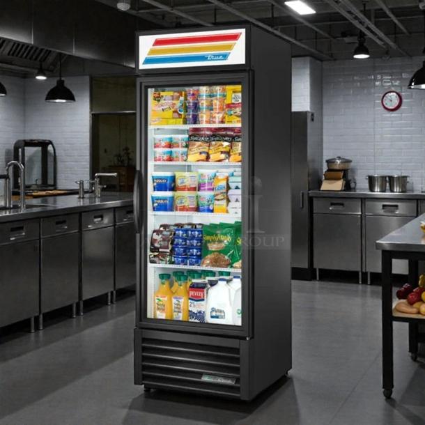 True GDM-23-HC~TSL01 27" glass door merchandiser in excellent condition, tested and working, showcasing various food items.