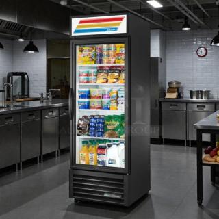 True GDM-23-HC~TSL01 27" glass door merchandiser in excellent condition, tested and working, showcasing various food items.