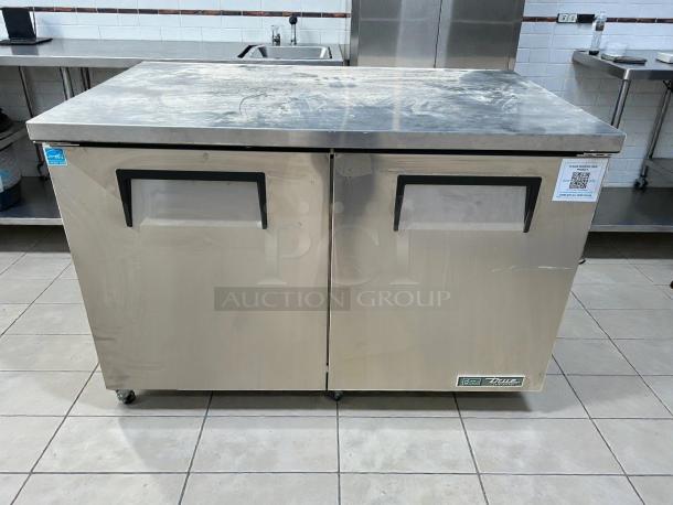 True TUC-48-HC undercounter refrigerator, new condition, 48 3/8", stainless steel, dual doors, verified working, True logo visible.