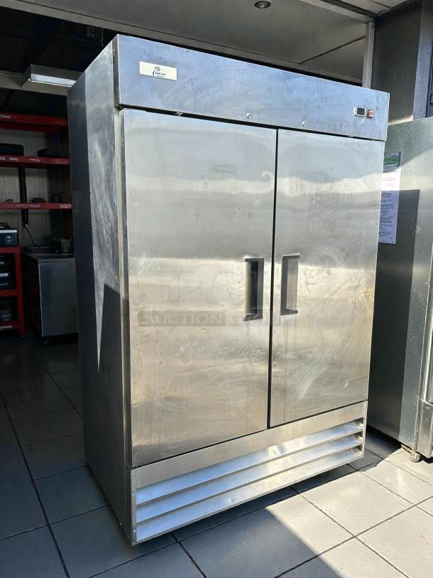 Cooler Depot XB54F-HC 2-door commercial upright freezer in stainless steel. Tested, working, with visible surface marks.
