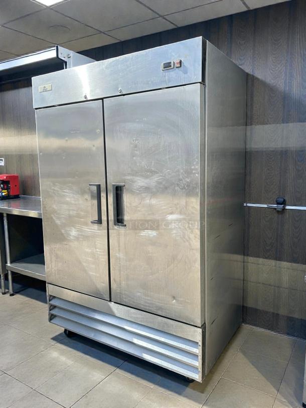 Cooler Depot XB54F-HC 2-Door Commercial Freezer in stainless steel; upright, tested and working, slight surface wear.