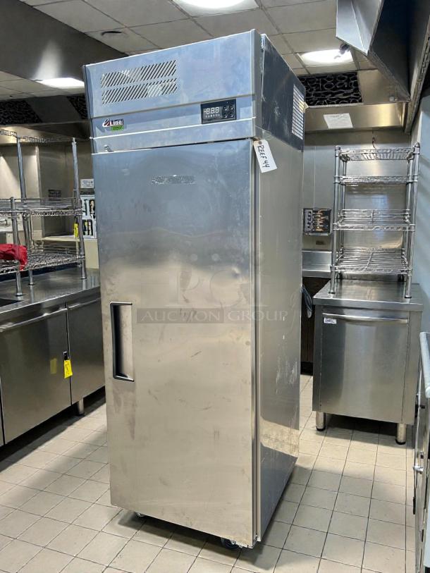 Turbo Air EF24-1-N-V 28" solid door reach-in freezer, great condition, tested working, digital display, in stainless steel kitchen setting.