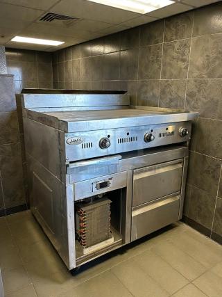 Jade 36” thermostatic griddle with two refrigerated drawers, stainless steel, tested and working, in good condition.