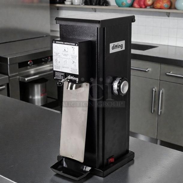 Ditting KR1403 commercial coffee grinder in excellent condition, tested and working, with visible branding and operation instructions.